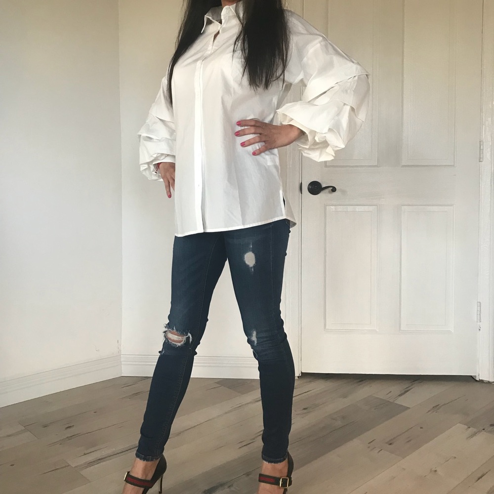 White shirt with ruffled sleeves